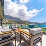 Kazarman, Kalkan'in Kalbinde Denize, Merkeze *